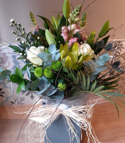 Mixed Water Bouquet - Stunning mixed flowers arranged in water.
